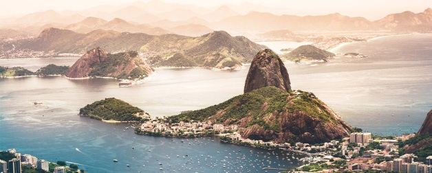 Sugarloaf Mountain is a peak situated in Rio de Janeiro, Brazil, at the mouth of Guanabara Bay on a peninsula that juts out into the Atlantic Ocean