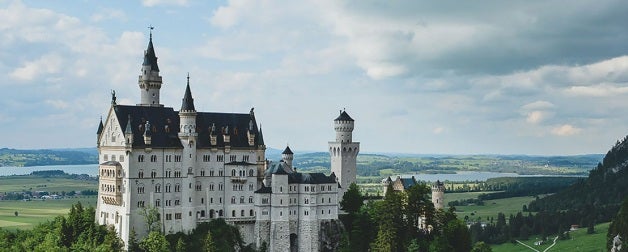 Neuschwanstein Castle n a rugged hill above the village of Hohenschwangau near Füssen in southwest Bavaria, Germany