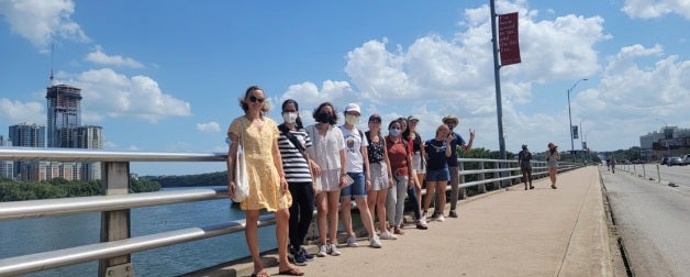 new international students on the south congress bridge