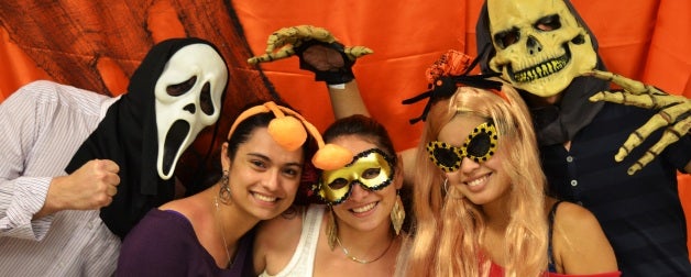 ELC students enjoy halloween by taking group photos in costumes