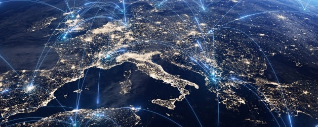 A view of earth from space with lines indicating communication across the globe