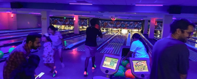 ISSS students enjoy themselves while glow bowling