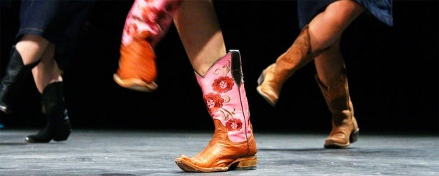 Boots scoot during a Texas two-step lesson