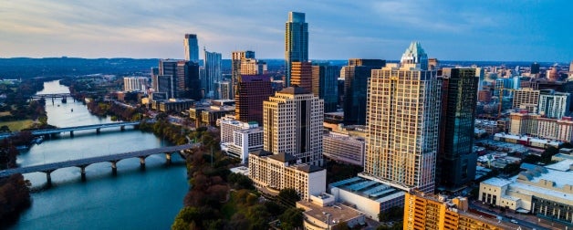 Aerial view of Ladybird Lake and downtown Austin at twilight