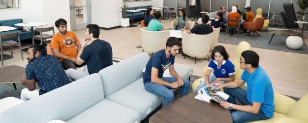 Students gather in the Texas Global loung