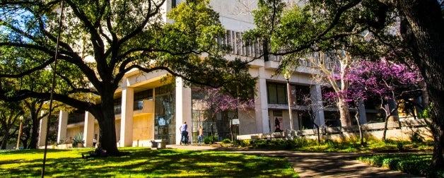 Harry Ransom Center from outside in spring on a sunny day