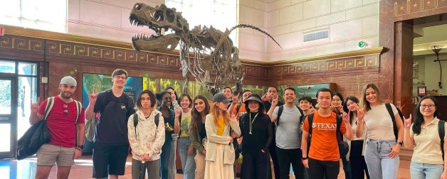  ELC students smile for a group photo whole touring the Texas Science and Natural History Museum