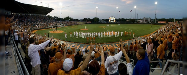 Students and fans cheer on the UT men's baseball team at the UFCU Disch-Falk Field during the evening