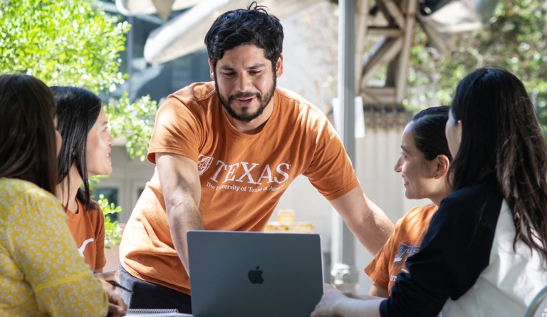 Adolfo gathered with other students