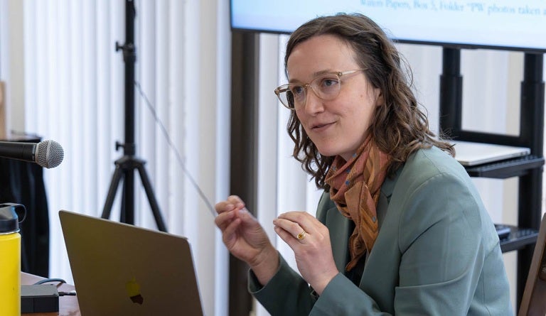 Ransom Center researcher Jayme Collins prepares to record a podcast