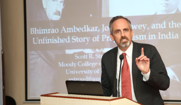 Scott Stroud speaks at the inaugural lecture of the Dewey studies center