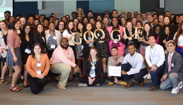 topical seminars participants pose with the google logo at the event 