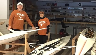 UT alumnus Erwin Miller and his wife prepare crafts for rowing