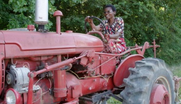 Esther Lupfaya drives a tractor
