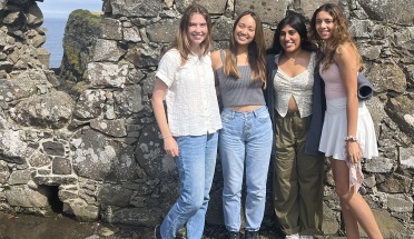 Four President's Award for Global Learning students smile in Ireland