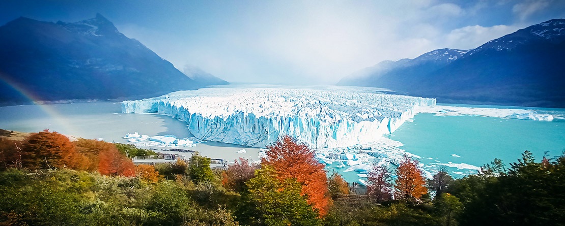 Perito Moreno Glacier in autumn with fog over the mountains