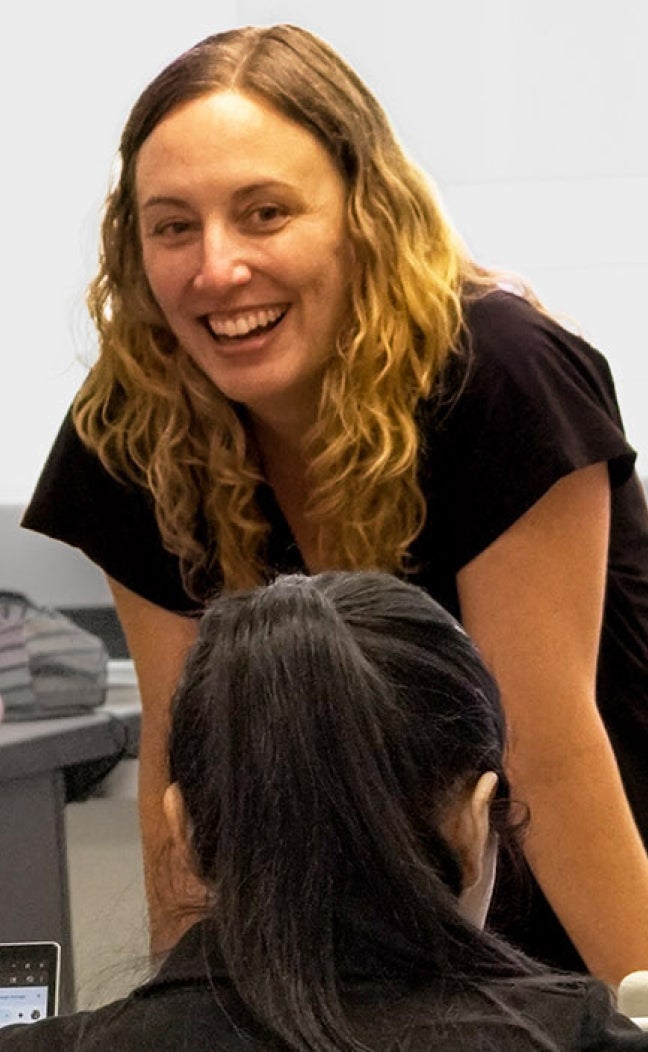English Language Center instructor Sarah Episcopo smiles at her class
