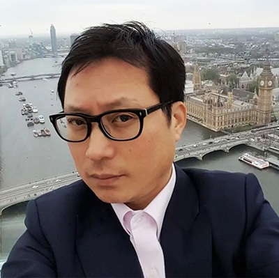 Landmark Entertainment CEO Sam Chi poses for a selfie above London