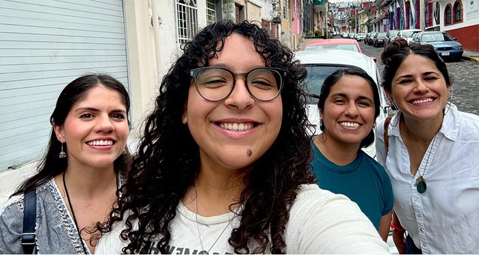 Students pose for a selfie on the streets of Xalapa