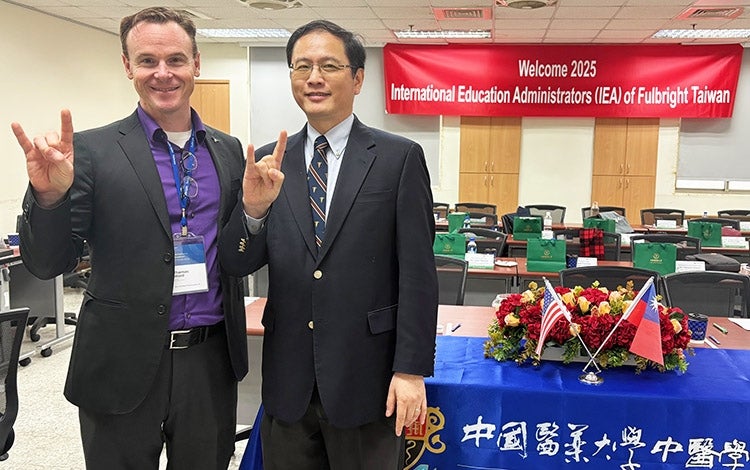 UT Fulbright Scholar 2025-26 Thomas Ward with colleague in Taiwan