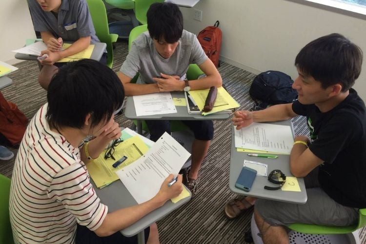 Students study together at a classroom.