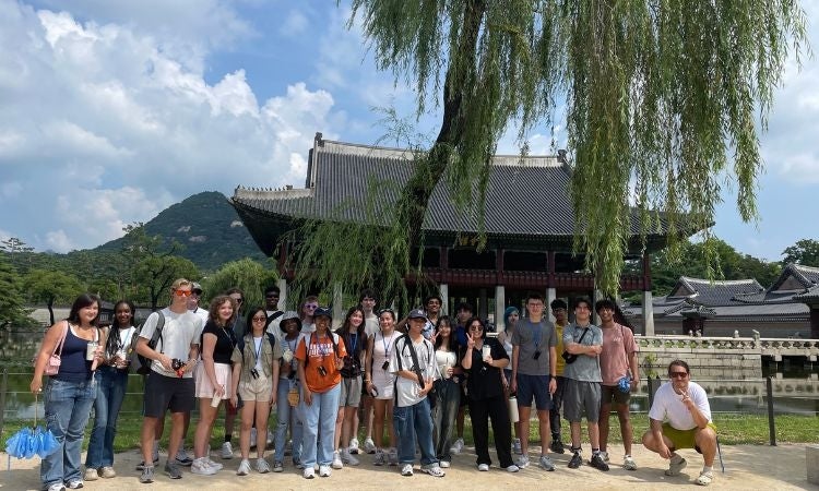 Students outside of a Korean home in South Korea. 