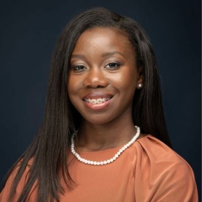 student poses for a portrait