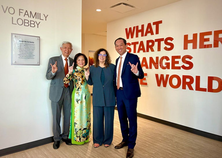 Andrew and his parents, Dang and My Le Vo, alongside Sonia Feigenbaum, senior vice provost for global engagement and chief international officer. 