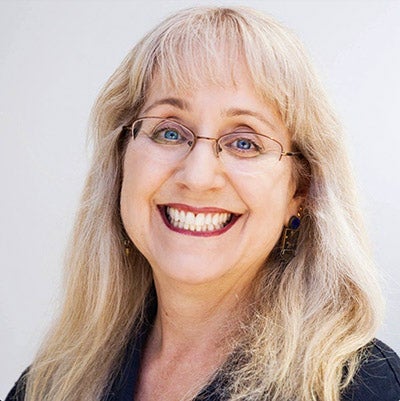 English Language Center instructor Tracy Frank smiles at the camera