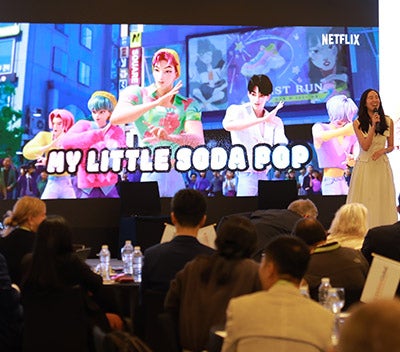Professor Chuyun Oh leading a K-pop panel at the 2026 Texas Global Alumni Summit