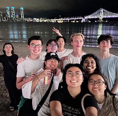 2024 Take the World by the Horns students pose by the water in Seoul